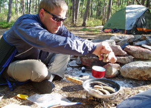 Going light doesn’t necessarily mean eating badly. A lightweight stove, two pots  and, maybe, a frypan, make an adequate kitchen for an overnight