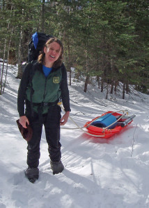 With work to do in the wilderness, this backcountry ranger in New Hampshire’s White Mountain National Forest uses both a pack and a pulk to transport what she needs in winter. 