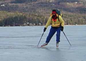  Jamie Hess wears two hats and mittens with liners on a cold day of skating on Lake Sunapee.  His cross-country ski boots are warm with thick socks beneath.