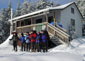 Happy New Year! The only sad part of this New Year’s celebration was leaving the AMC’s High Cabin on Cardigan Mountain in New Hampshire and snowshoeing back to “civilization.” Photo by David Shedd