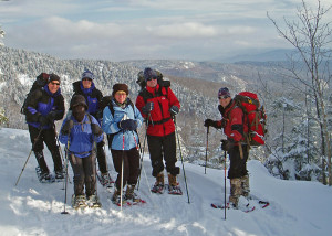 Happy Campers! A sunny morning, fresh snow on the trail, a beautiful overlook high on a mountain. What better way to spend the first days of a new year!? (Tim Jones photo)